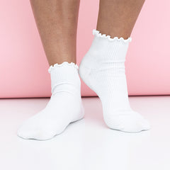 girl wearing ruffle edge socks