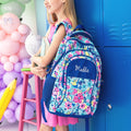 girl wearing watercolor whimsy backpack 