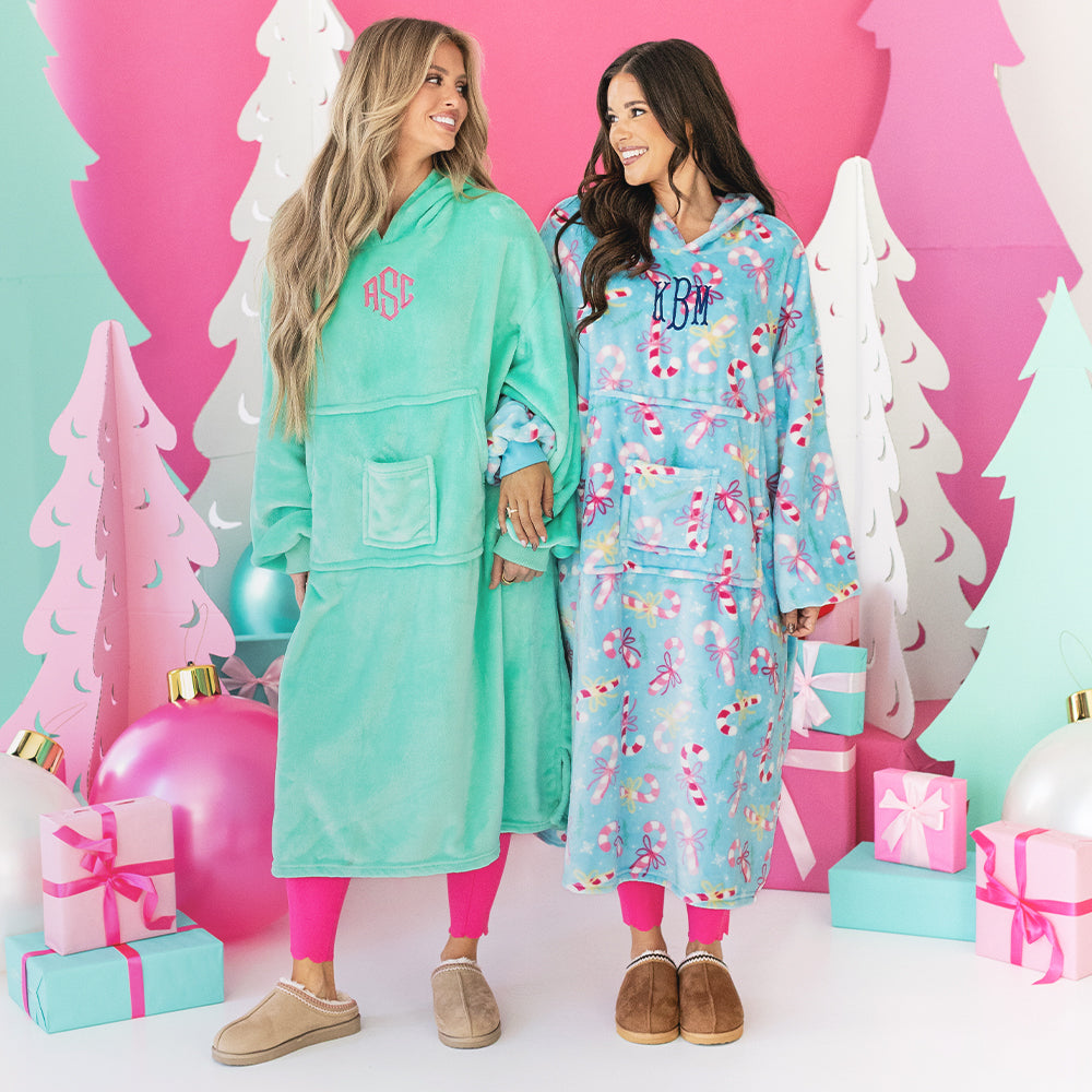 girls wearing monogrammed xl blanket hoodie in candy cane cutie and mint 