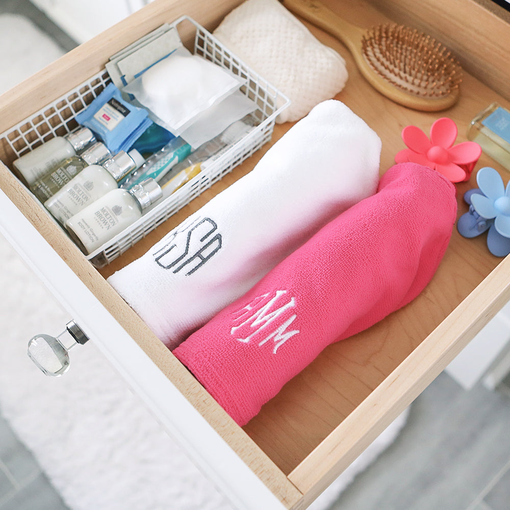 personalized white and pink hair wrap towels in drawer
