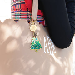 green Christmas bag charm keychain on bag
