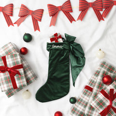green bow stocking flatlay