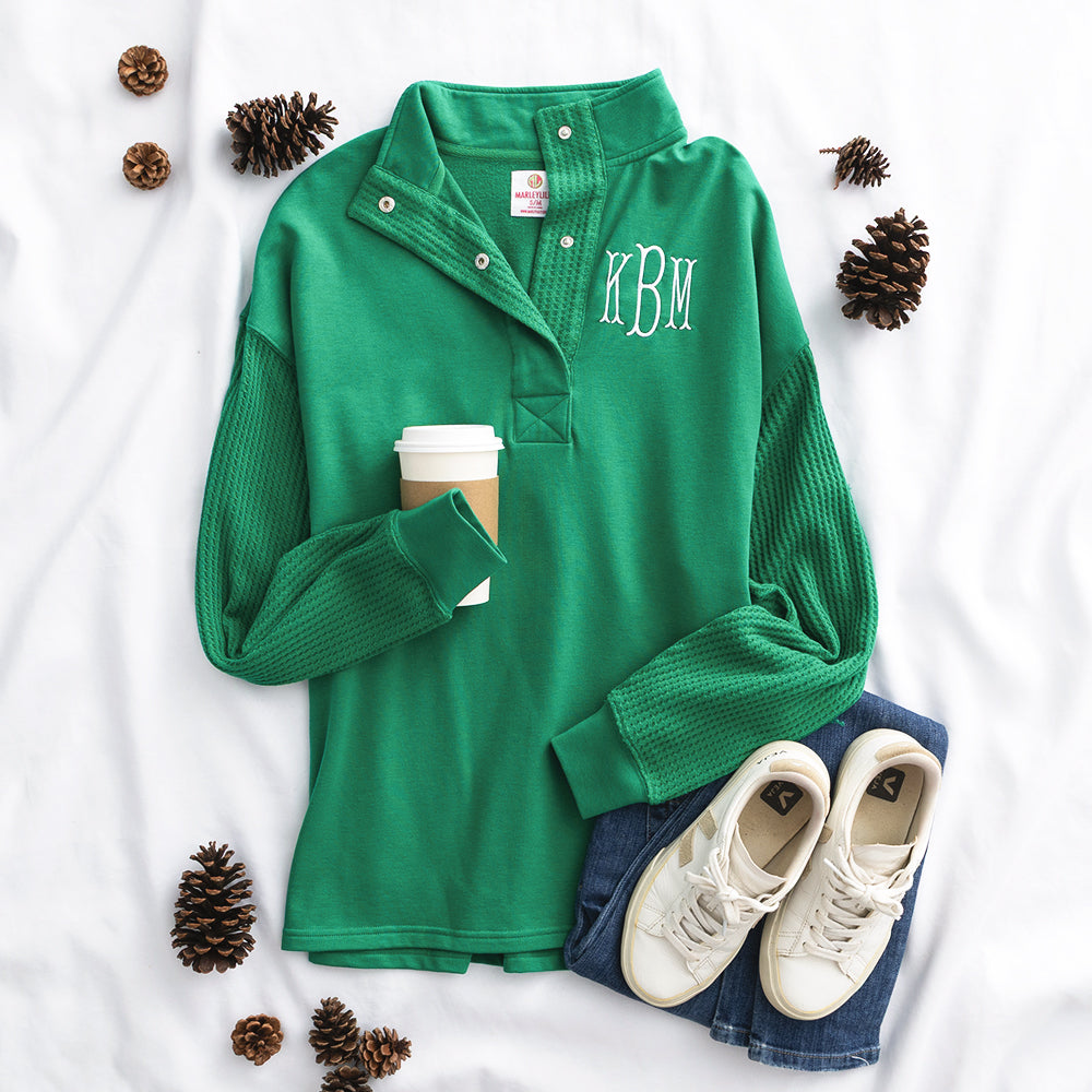 green waffle snap pullover flatlay