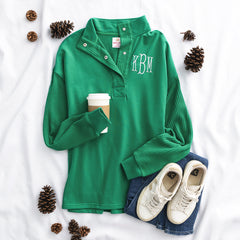 green waffle snap pullover flatlay