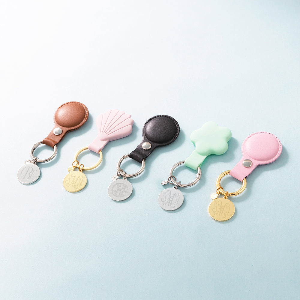 group shot of 5 airtag keychains