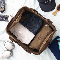 dark brown kids waxed canvas overnight bag inside shot