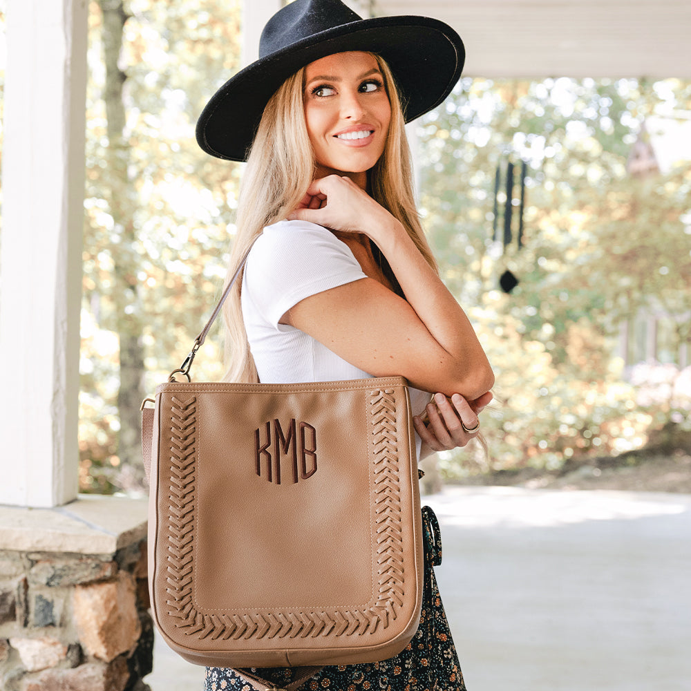 girl carrying whipstitch hobo purse over shoulder