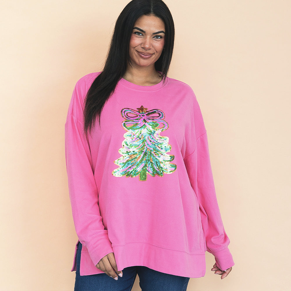hot pink christmas sweatshirt on Julia ann