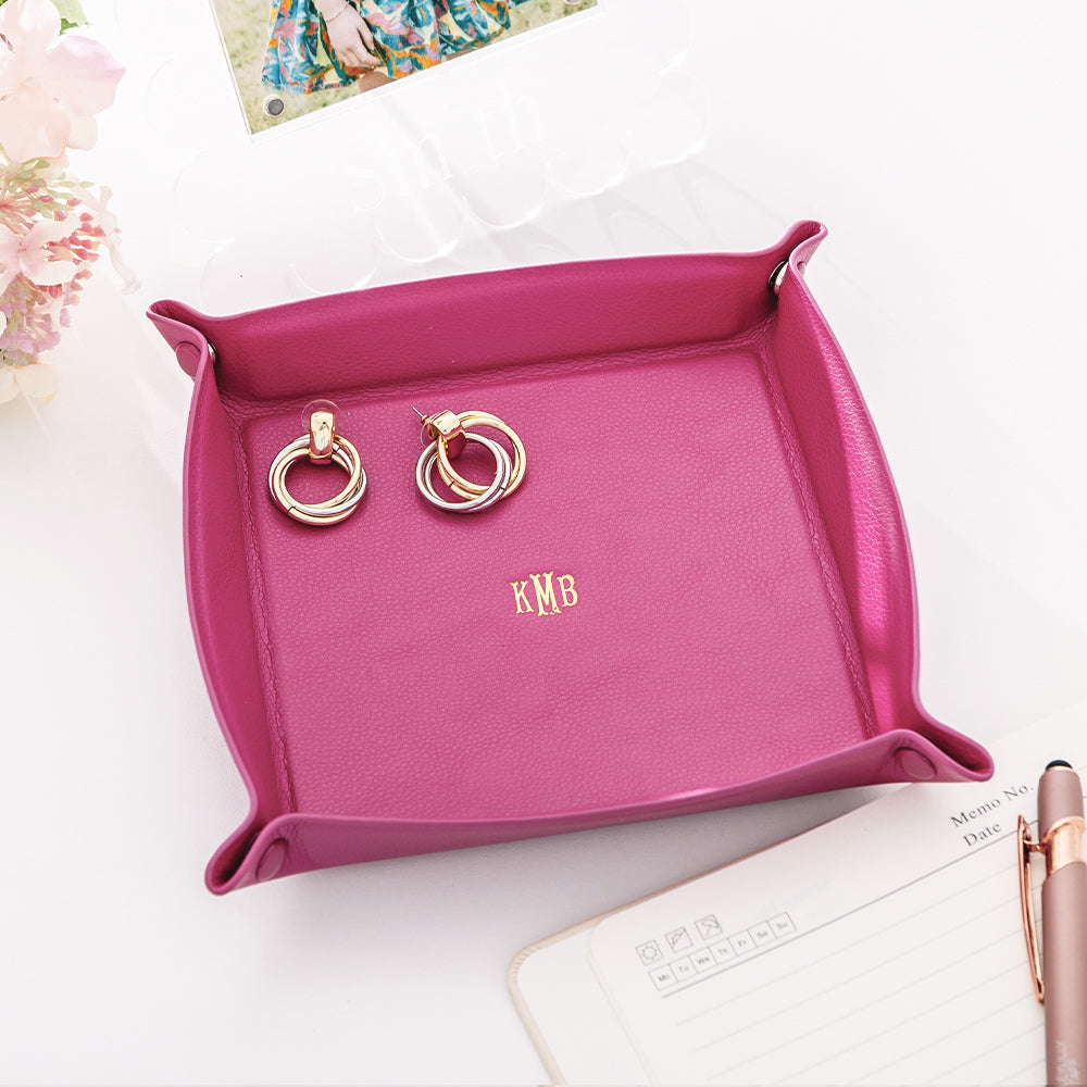 hot pink monogrammed valet tray on counter