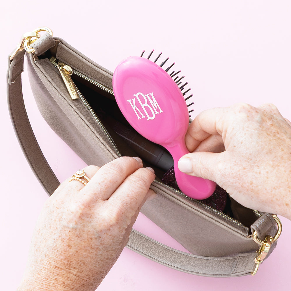 hot pink purse hairbrush in purse