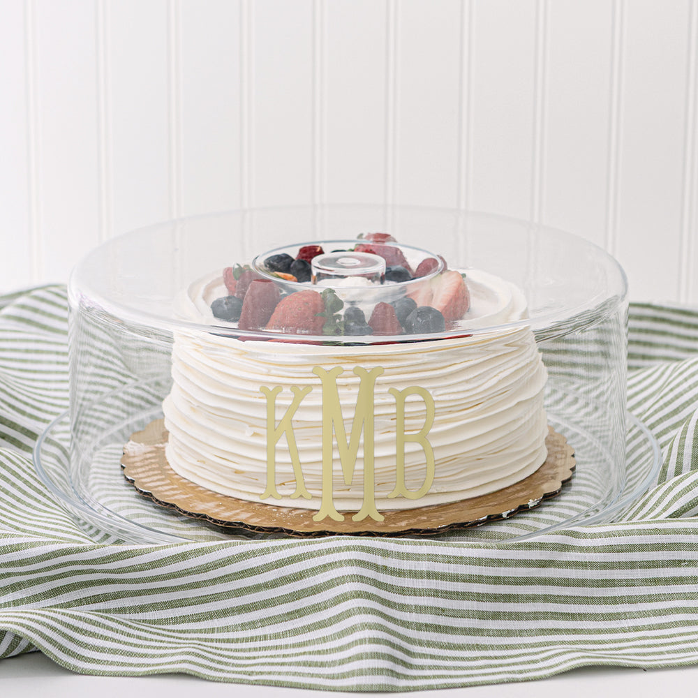 monogrammed cake tray with cake and berries