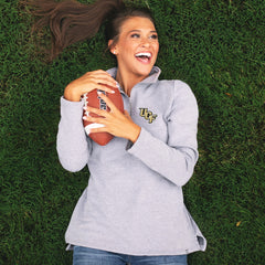 girl in UCF gray pullover sweatshirt
