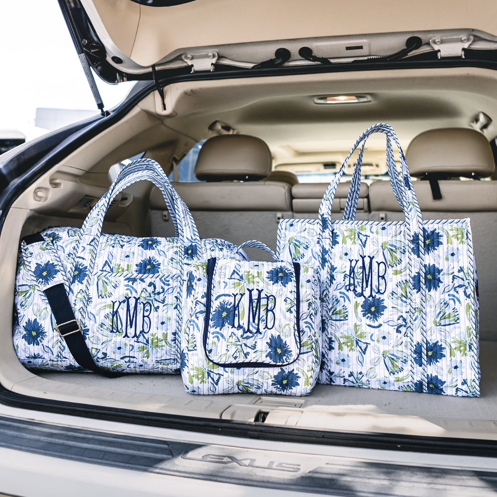 indigo painted petals monogrammed quilted weekender hanging toiletry bag and tote bag 