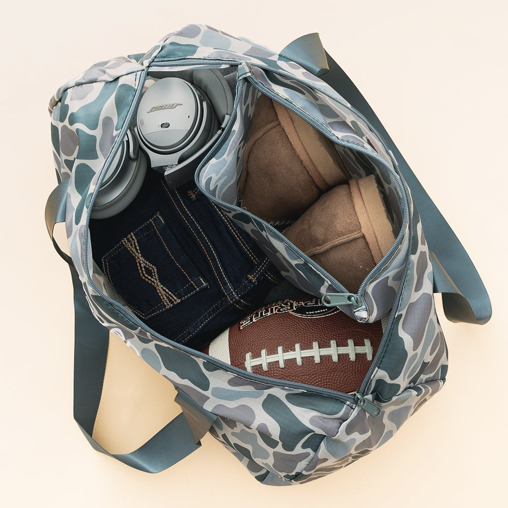 inside of classic camo kids activity bag 