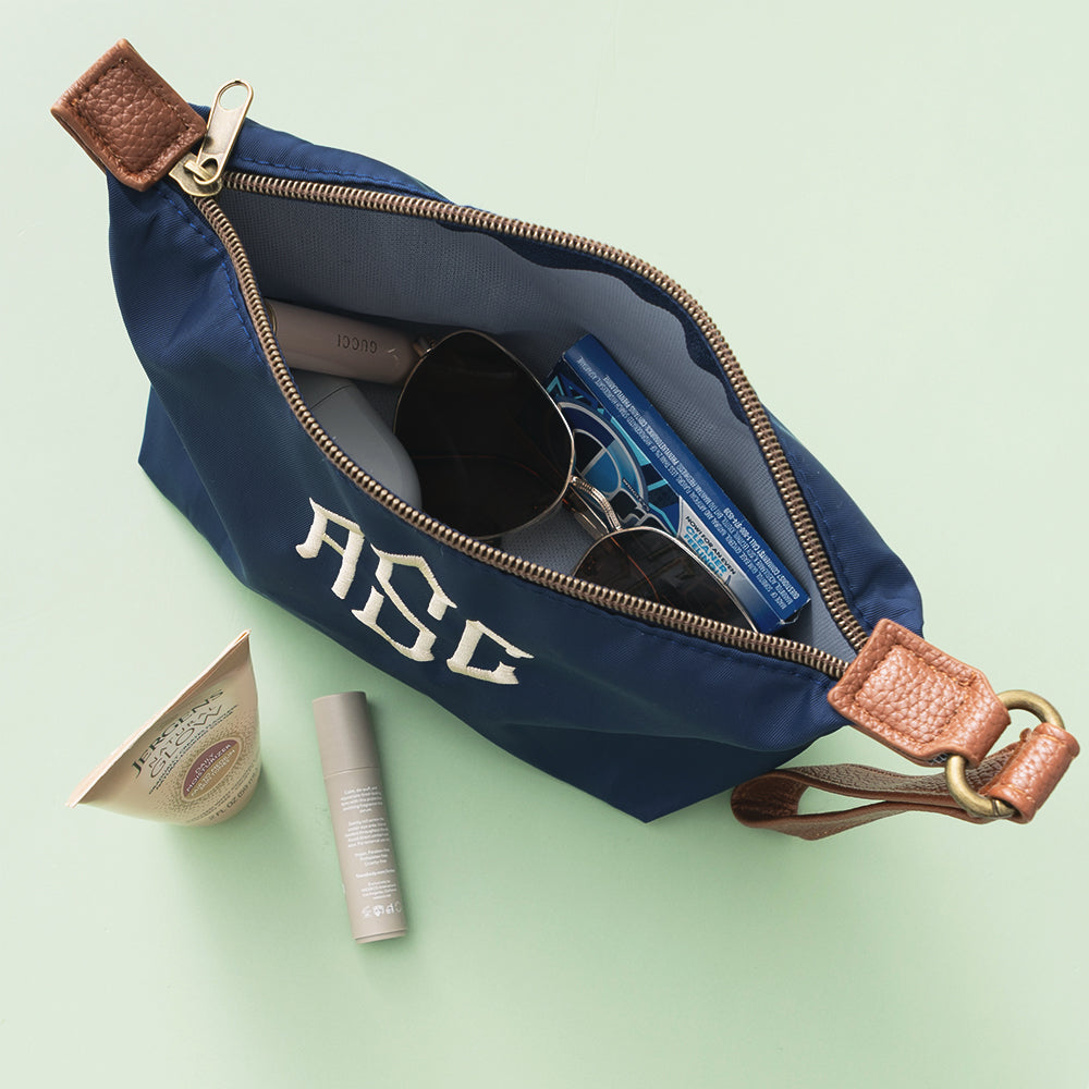 inside of navy monogrammed lightweight wristlet 