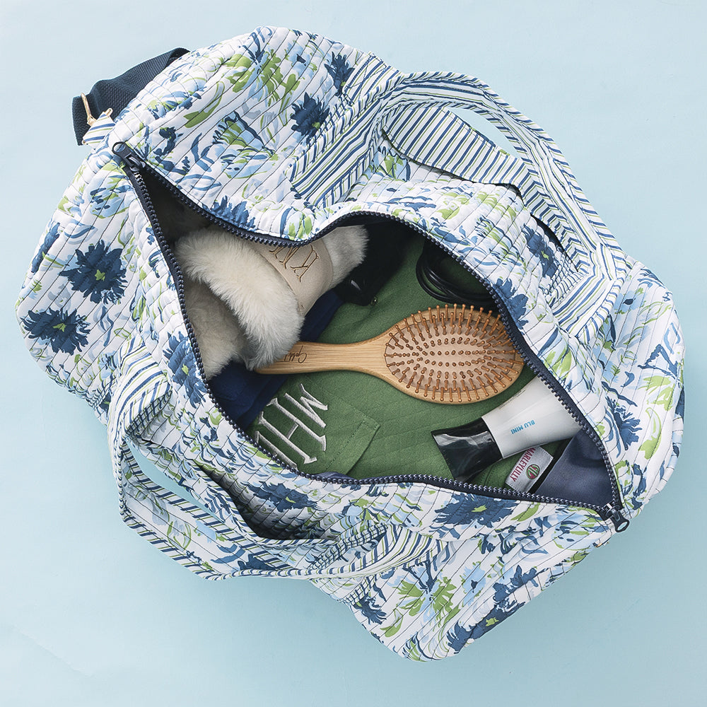 inside of quilted weekender in indigo painted petals 