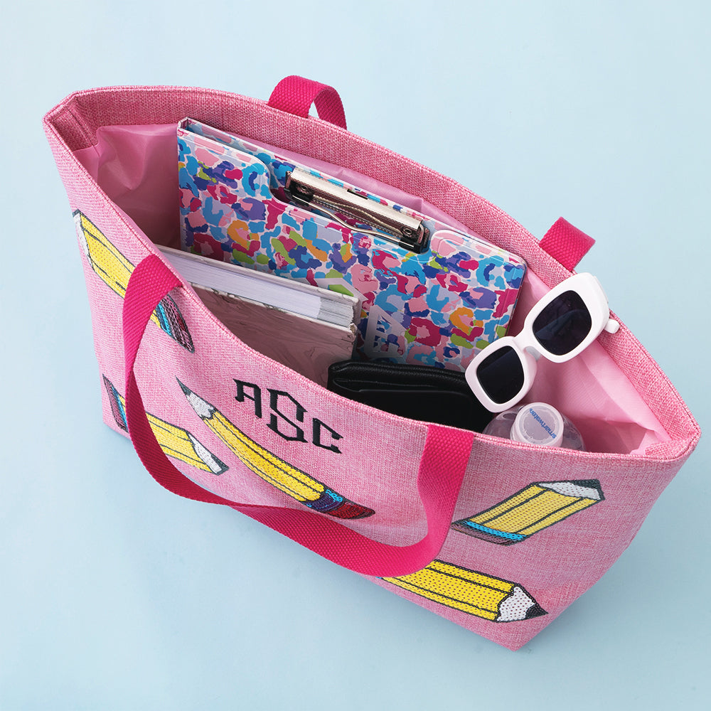 inside of sequin tote bag in pink pencils 