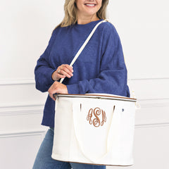 ivory cooler on shoulder navy sweatshirt