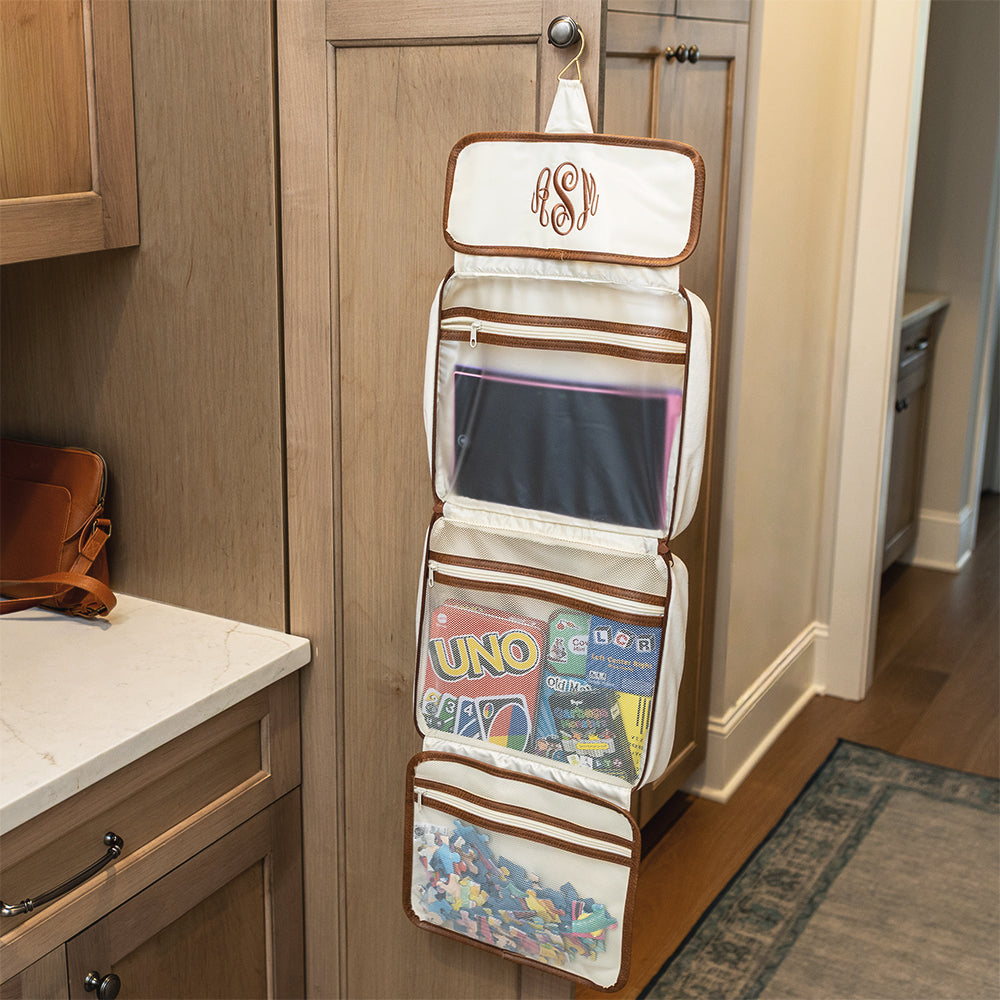 ivory hanging organizer hanging on cabinet