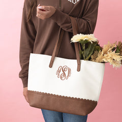 ivory scallop tote on arm