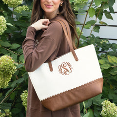ivory scallop tote on shoulder