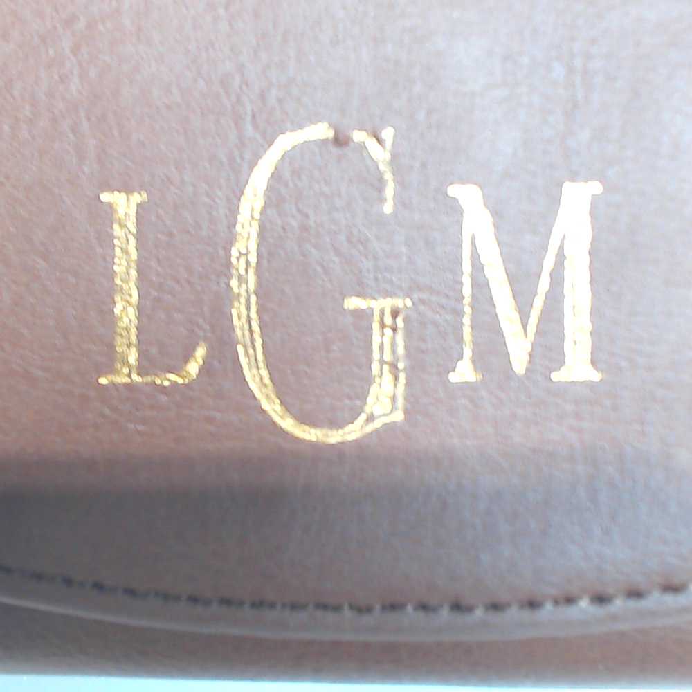 BLOOPER ACCESSORY: Monogrammed Leather Wallet