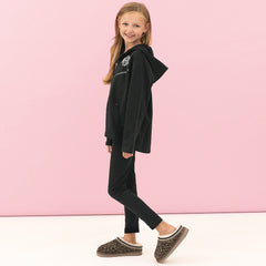girl wearing black full zip hoodie side