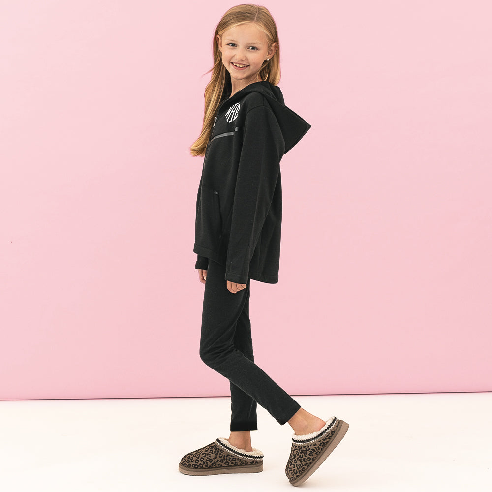 girl wearing black full zip hoodie side