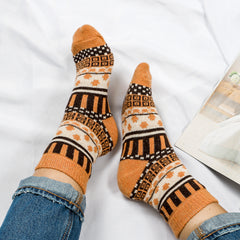 harvest socks on white sheet
