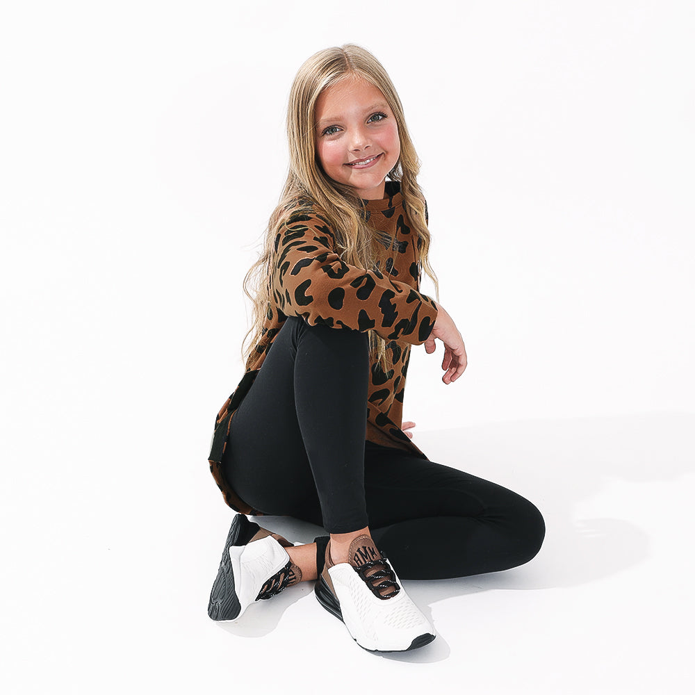 Girl wearing Hickory Crewneck + Sneakers