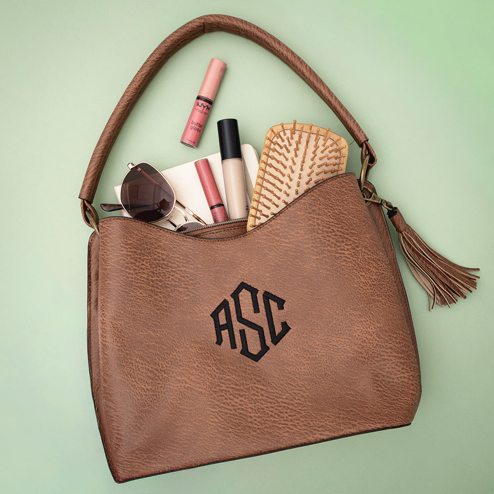 camel brown cheyenne purse flatlay