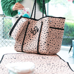 monogrammed neoprene diaper bag in blush safari