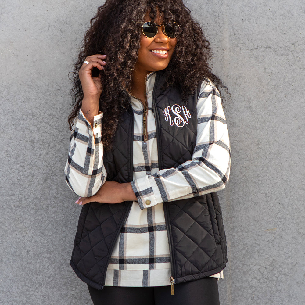 wearing puffer vest in black