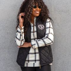 wearing puffer vest in black