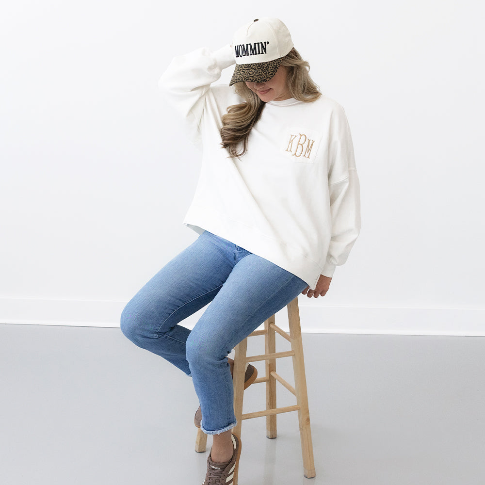 leopard mom trucker hat on emily