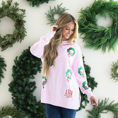 light pink monogrammed sequin wreath sweatshirt on rachel