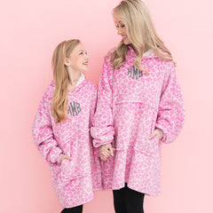 mom and girl wearing monogrammed pink cheetah blanket hoodie close up