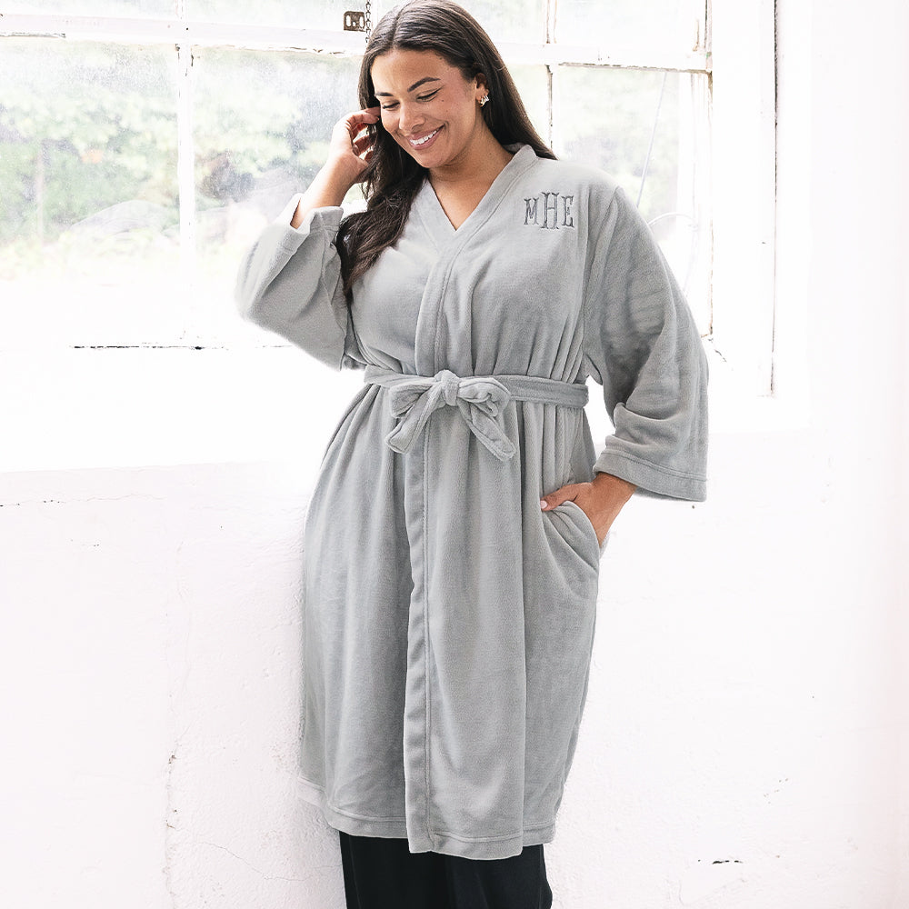 girl wearing monogrammed full length plush robe