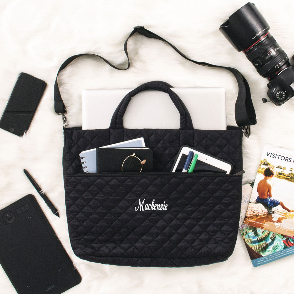 black quilted laptop bag flatlay name
