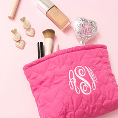 heart cosmetic bag with earrings spillshot.jpg