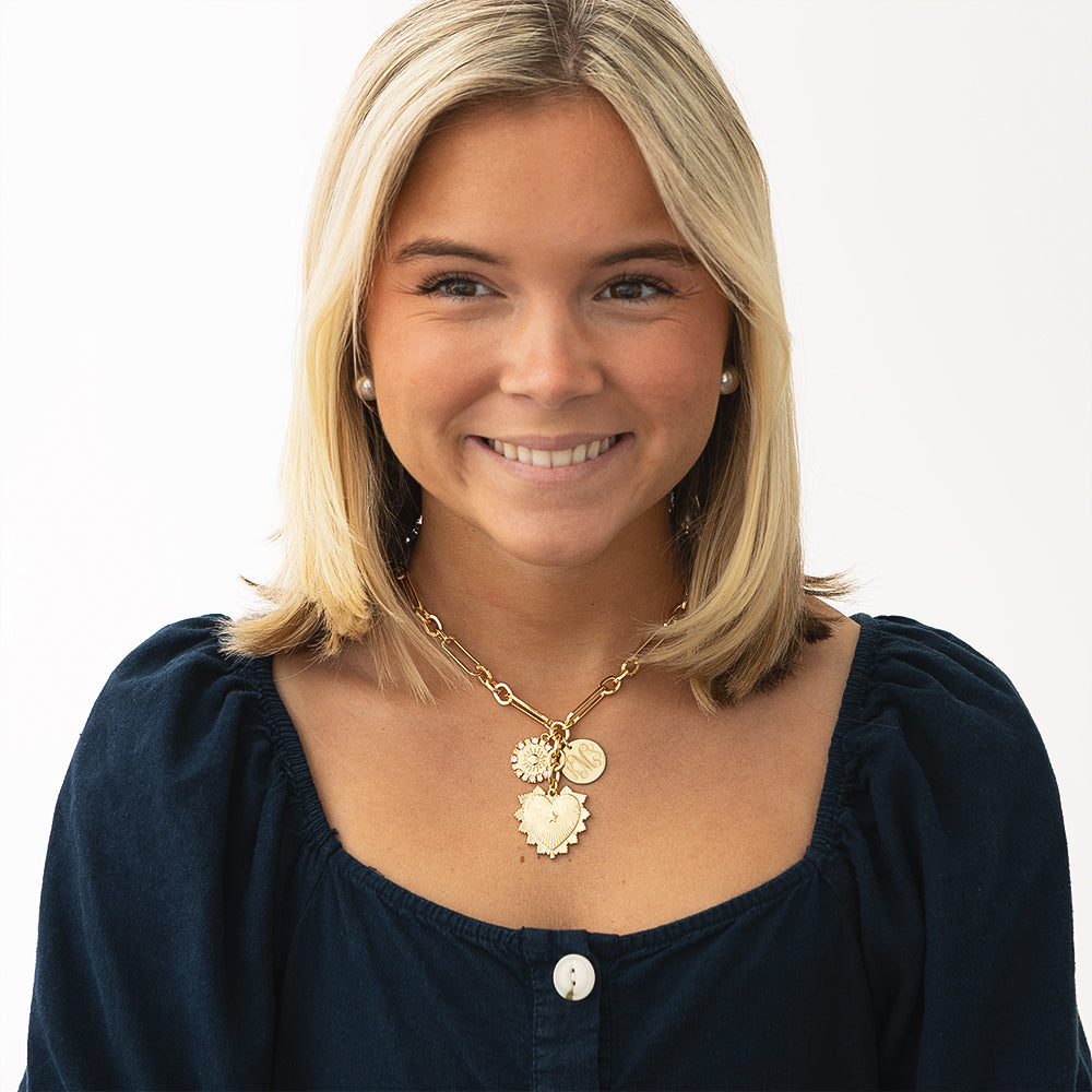 Girl Wearing Sun Heart Necklace