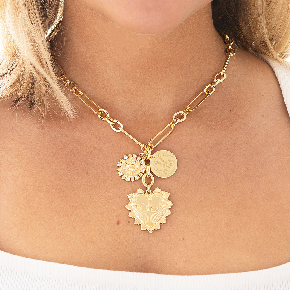 Girl Wearing Sun Heart Necklace close up