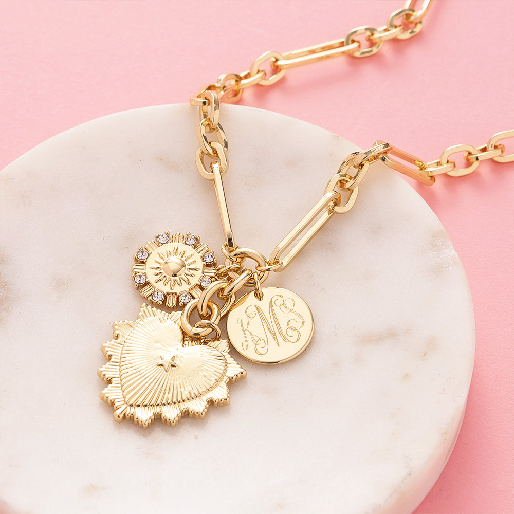 Sun heart necklace on marble dish