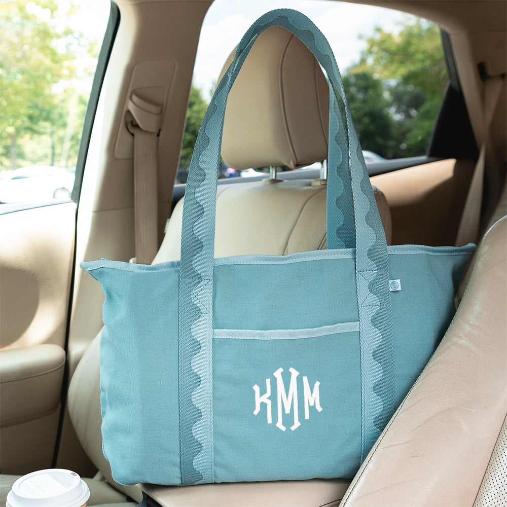 mist anywhere tote bag in car with white monogram