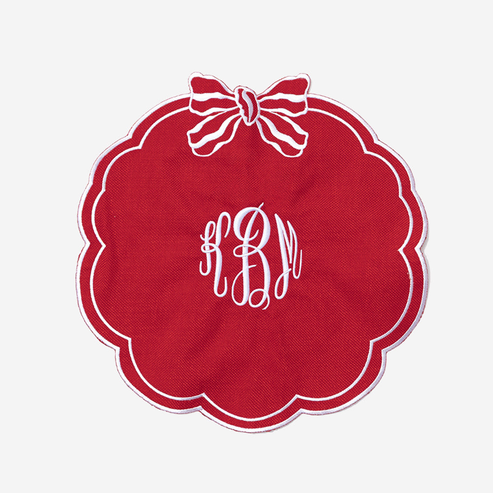 monogrammed bow scallop placemat in red