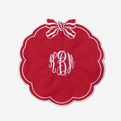 monogrammed bow scallop placemat in red