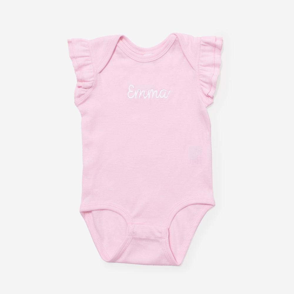 Pink baby onesie with 'Emma' printed on a white background