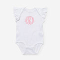 White baby onesie with pink monogram on a white background