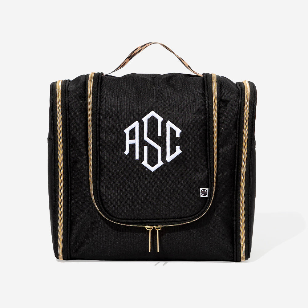 monogrammed hanging toiletry bag in black classic cheetah