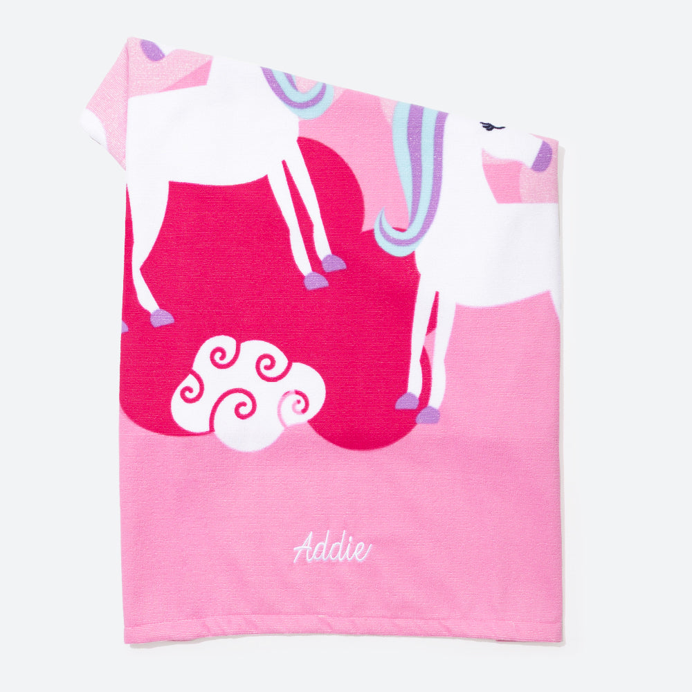 kids pink unicorn beach towel with name personalization